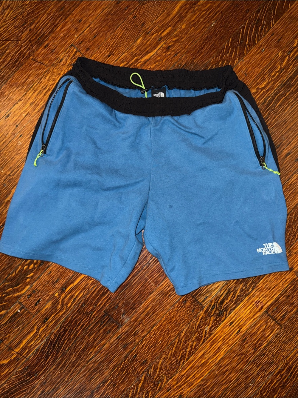 The North Face Men's Blue Athletic Shorts with Black Waistband